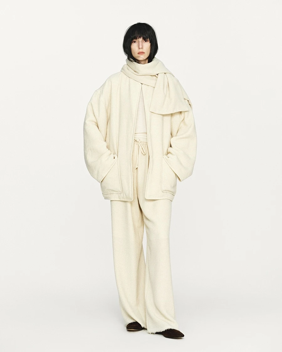 Ivory textured wool fringed straight pants