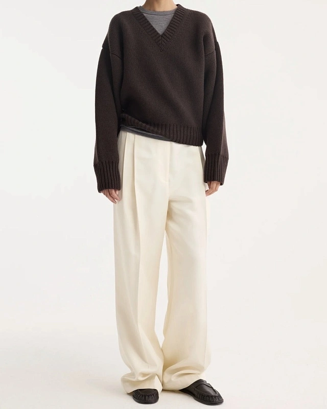 Sculptural compact v-neck