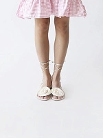 WRAP AROUND FLAT FLOWER SANDALS SATIN CREAM